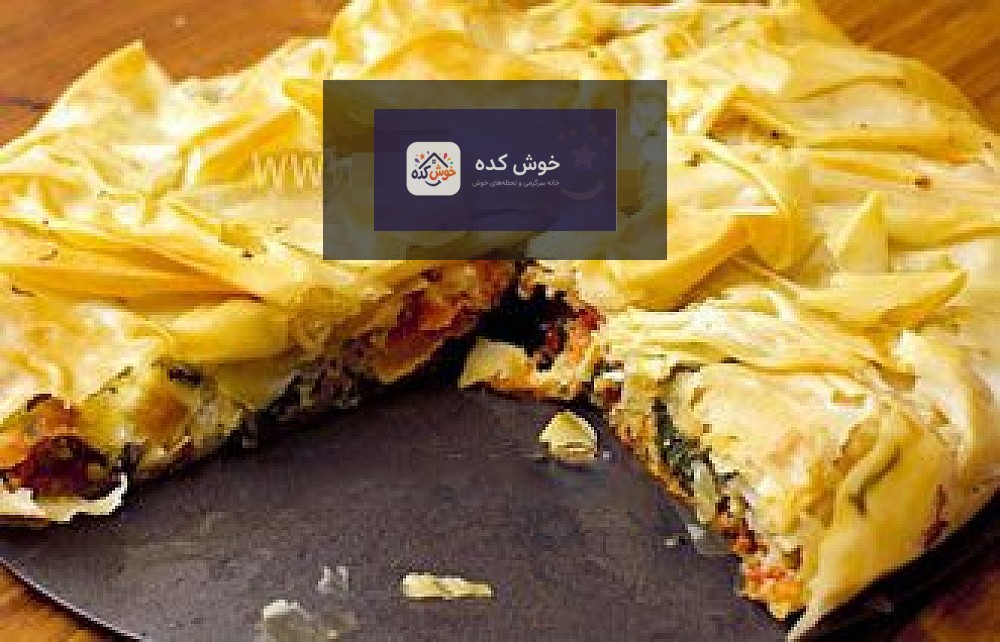 پاچانگای گوشت با نان لواش پیچیده شده و آماده سرخ شدن