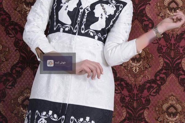 مدل مانتو مجلسی شیک سفید و مشکی با طرح گل‌های برجسته، مناسب برای مهمانی‌ها و مجالس رسمی