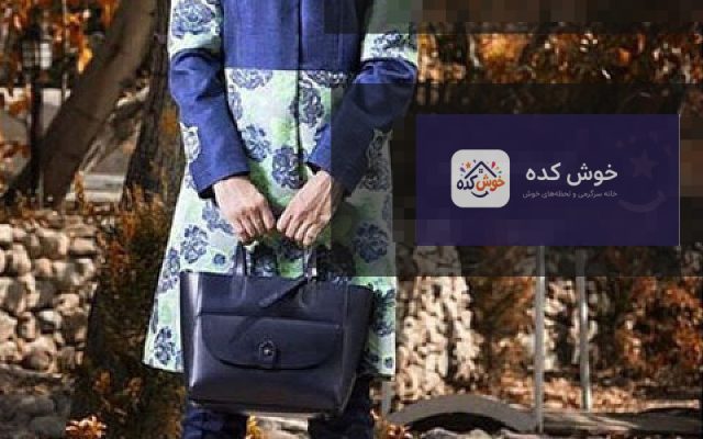 مدل مانتو مجلسی دوهه برای نوروز، مانتو بلند مشکی با طرح‌های طلایی و آستین‌های پف‌دار، مناسب مهمانی