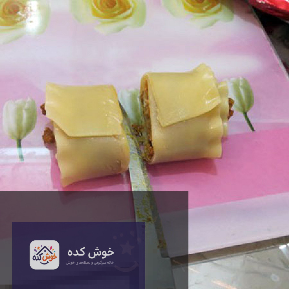 برش لازانیای لقمهای گلشکل برش عرضی از لازانیای لقمهای گلشکل، نمایش لایههای پاستا، سس و پنیر