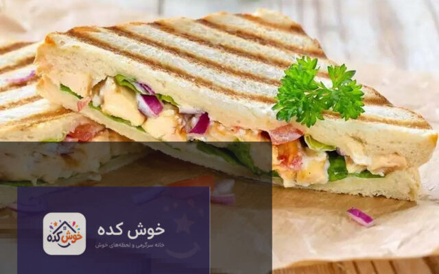 ساندویچ مرغ خانگی ساده و فوری با نان باگت و سبزیجات تازه، آماده سرو