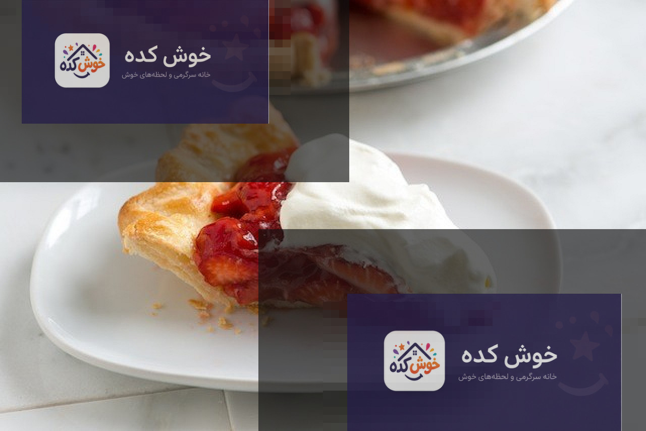 برشهای پای توت فرنگی با خامه برشهای پای توت فرنگی خانگی با لایه ضخیم توت فرنگی تازه و خامه زده شده در کنار آن