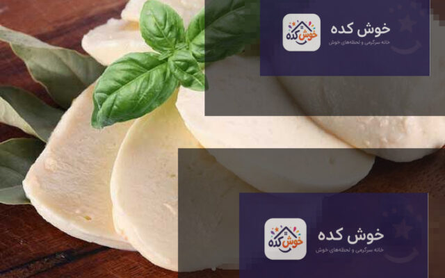 پنیر موزارلای خانگی تازه و کشسان روی تخته چوبی، آماده برای استفاده در غذاهای مختلف