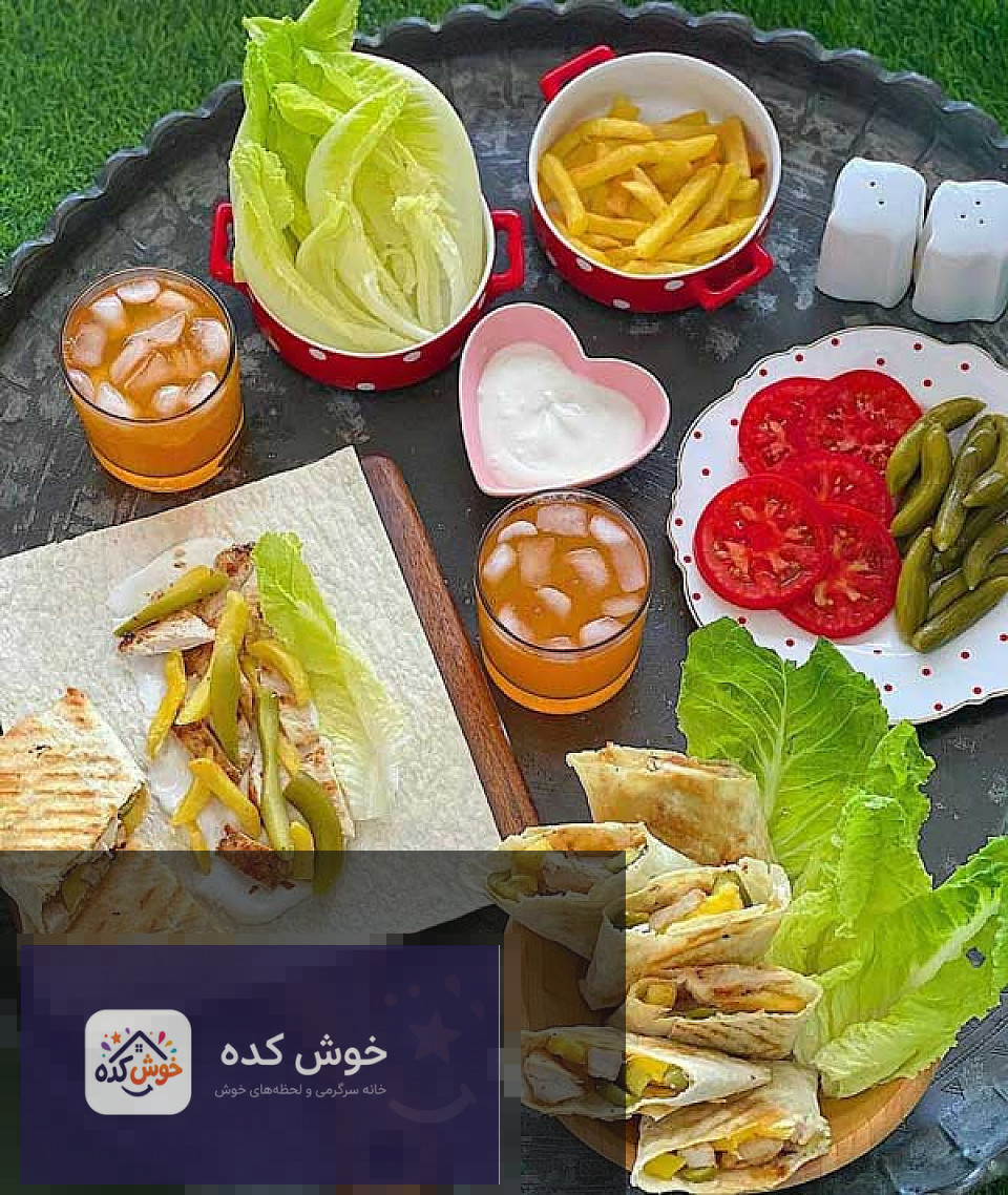ساندویچ شاورما مرغ خانگی در نان پیتا با مرغ طعم دار شده، سس مخصوص و سبزیجات تازه، آماده برای خوردن