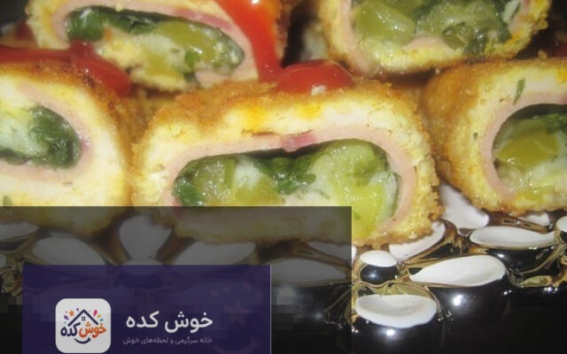 تصویری از رولت مرغ چرخ کرده آماده سرو، برش خورده و تزیین شده با سبزیجات تازه