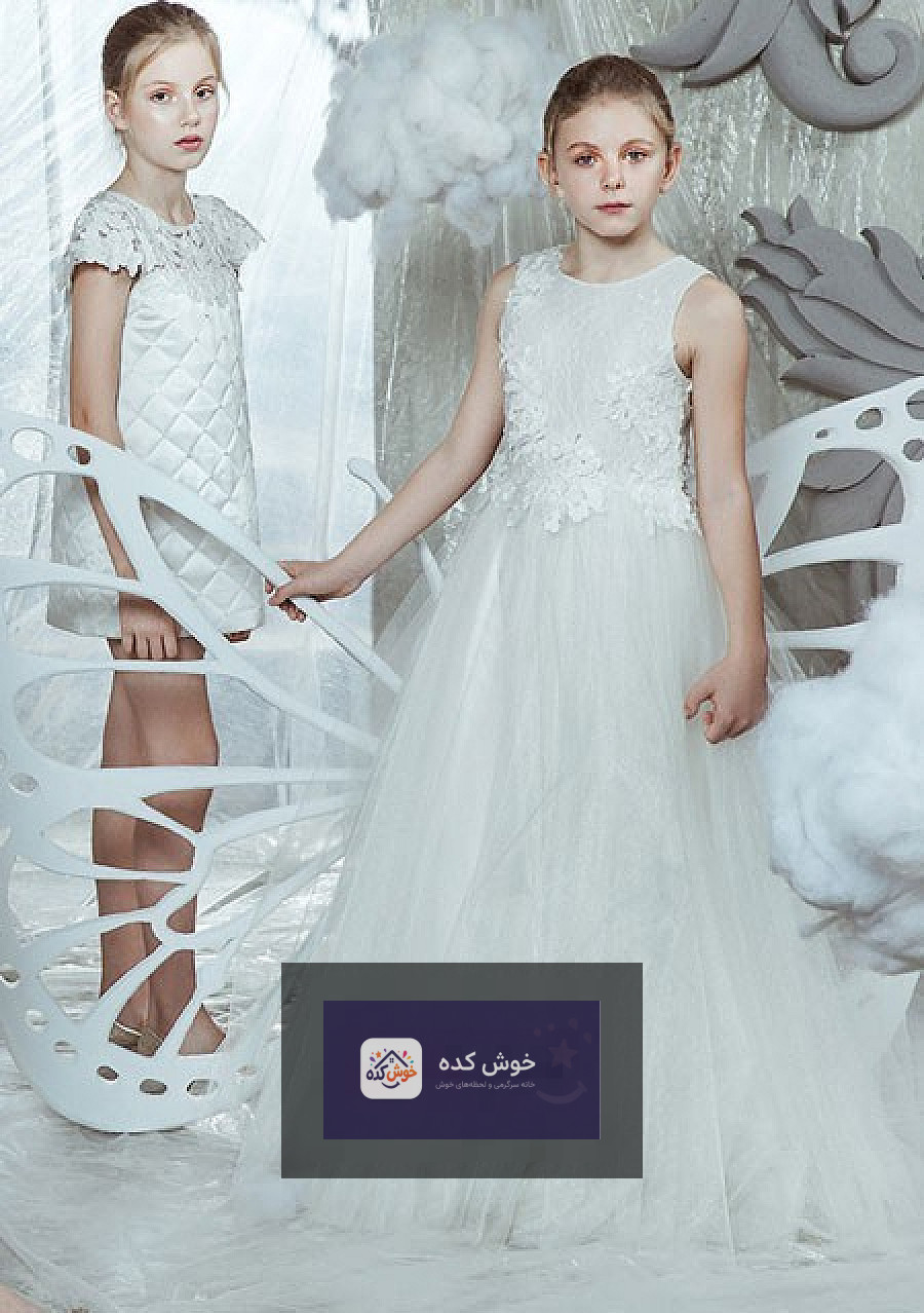 پیراهن مجلسی دخترانه سفید با دامن پف‌دار و گل‌های صورتی، مناسب جشن تولد و مهمانی