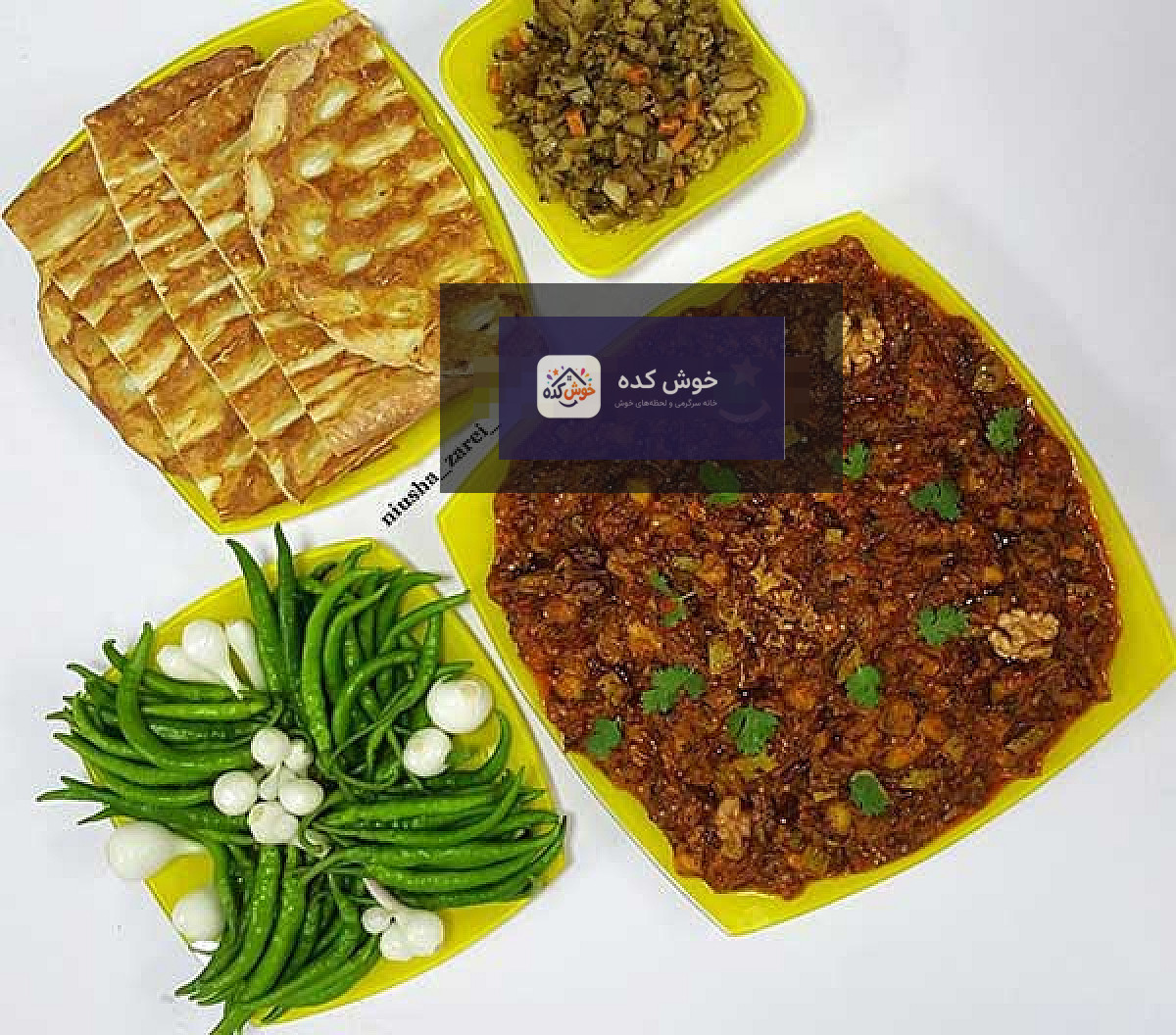 خورشت ملاقورمه سنتی گیلان در کاسه با تزئین سبزیجات معطر