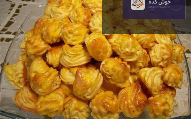 دوشس سیب‌زمینی مجلسی طلایی و خوش‌رنگ در ظرف سرو، آماده پذیرایی