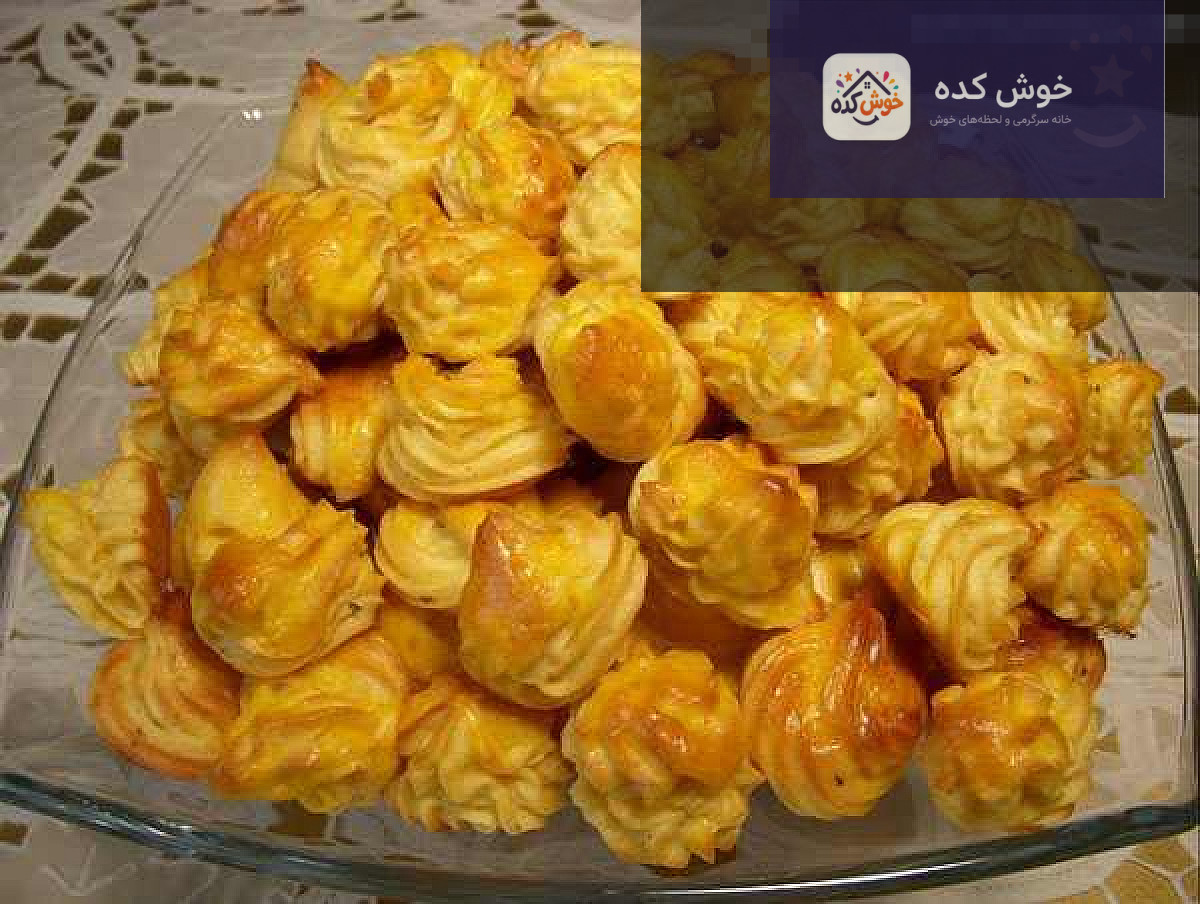 دوشس سیبزمینی مجلسی دوشس سیبزمینی مجلسی طلایی و خوشرنگ در ظرف سرو، آماده پذیرایی