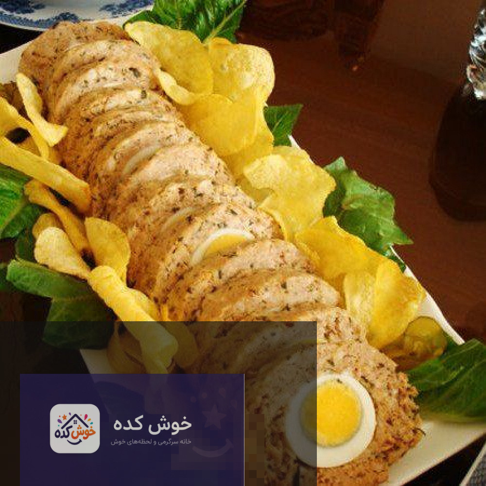 رولت تن ماهی و تخم مرغ رولت تن ماهی و تخم مرغ با نان لواش، تزیین شده با گوجه گیلاسی و سبزیجات تازه، آماده سرو